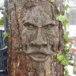 Design Toscano Lo spirito della foresta di Nottingham Greenman Scultura murale, poliresina, tinta legno, 38 cm